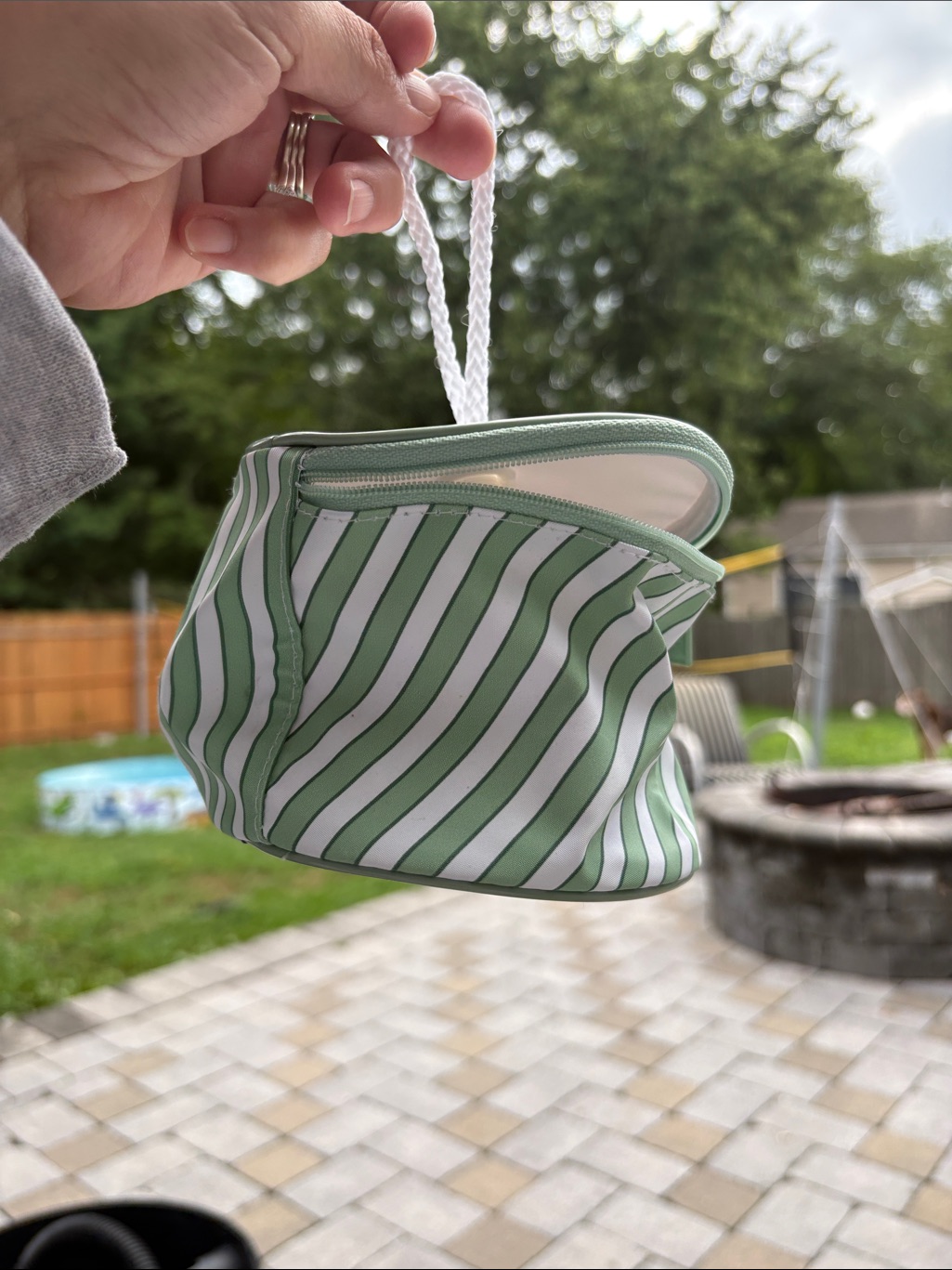 Clinique Green And White Striped Cosmetic Pouch With Branded Zipper